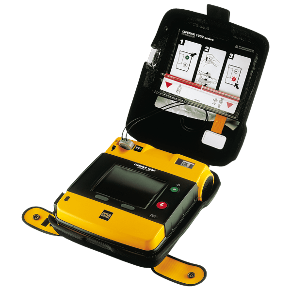Hjärtstartare Lifepak 1000 med EKG öppen, inkluderar användarmanual och tydliga bruksanvisningar.